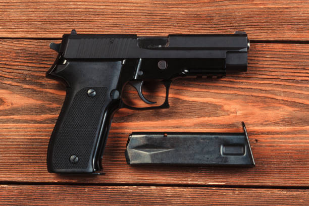 istock 9 mm pistol gun. 1162154650