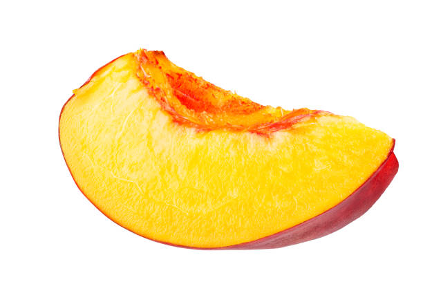 istock Nectarine fruit segment is isolated on a white background with the pen tool. The whole depth of field. 1162155107