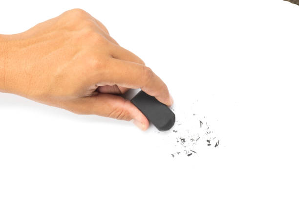 hand holding black eraser  on white background.