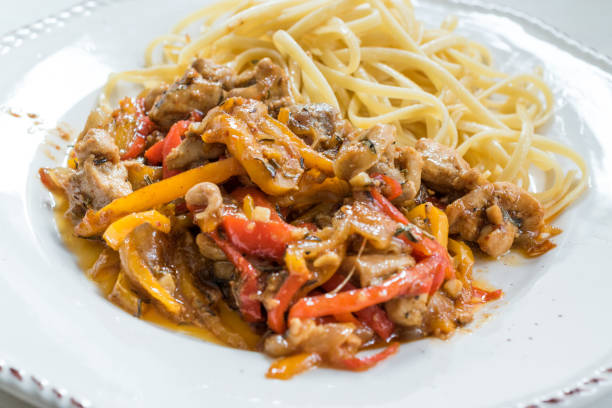 istock Chicken with Barbecue Sauce, Spaghetti and Julienne Vegetables 1162156092