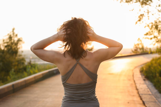 istock brunette girl doing sport exercises, stretching 1162157690