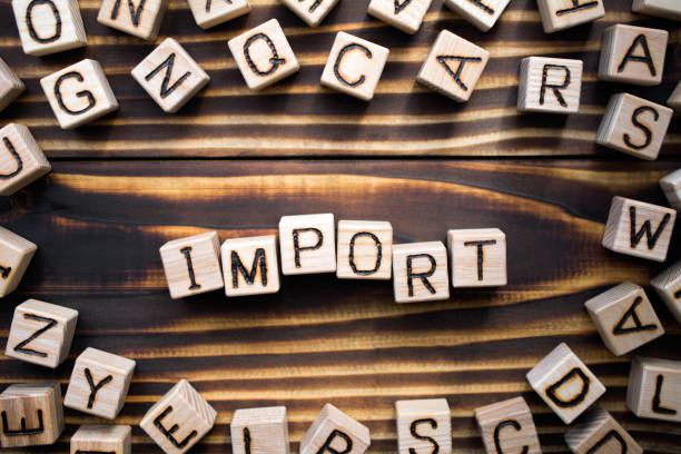 istock word import composed of wooden cubes 1162158558