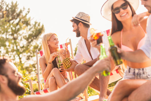 istock Friends at poolside party 1162160563