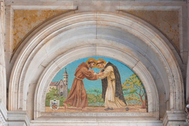 istock Massa (Tuscany): the Cathedral, mosaic depicting St. Francis surrounded by a marble arch 1162163501