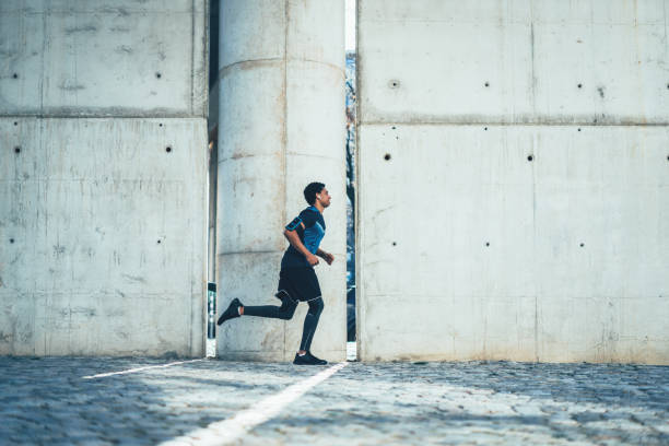 istock Afro-american sportsman running 1162165112