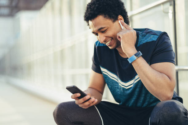 istock Choosing favorite music for hard work out 1162165124
