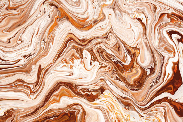 istock Caramel, cream dynamic and fluid raster texture. Abstract acrylic paints mixture color background. 1162166955