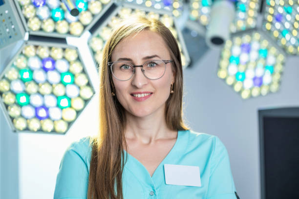 istock Obstetrician gynecologist in the operating room. 1162168519
