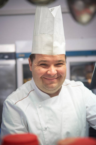 istock Smiling Male Chef Portrait 1162168530