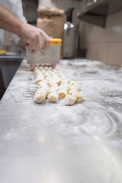 istock Chef Cutting Fresh Polenta Gnocchi 1162168568