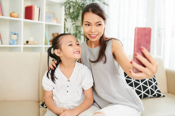 istock Selfie portrait with daughter 1162169405