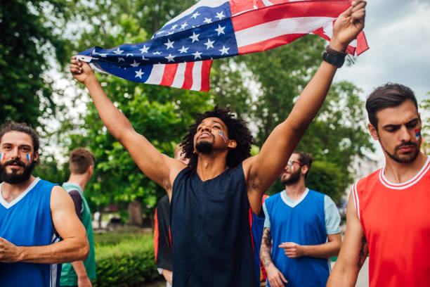 istock Men holding American flag 1162171416