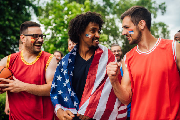istock Group of basketball enthusiasts 1162171494