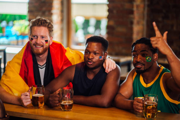 istock Group of men watching sports 1162176275