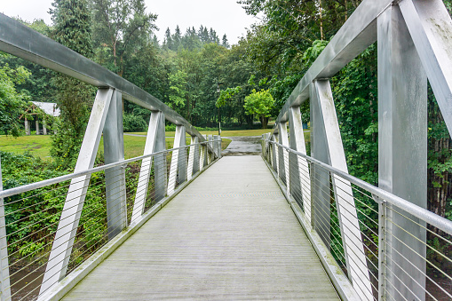 A walking bridge gives access to Maplewood Park in Renton, Washington.