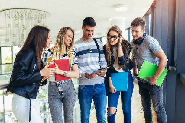 istock Group of young people are studying together in university 1162181946