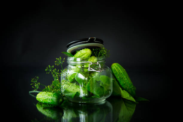 istock cucumbers and spices with herbs for canning in a jar 1162182377