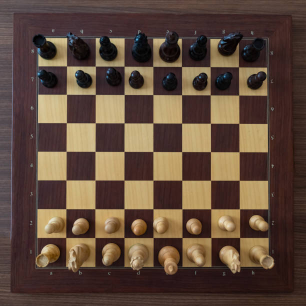 istock Top view on chess pieces on the board Before the chess tournament. 1162183307