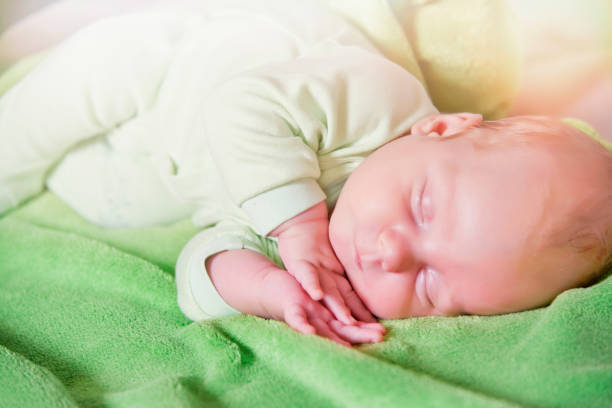 istock Portrait of beautiful baby sleeping 1162183340