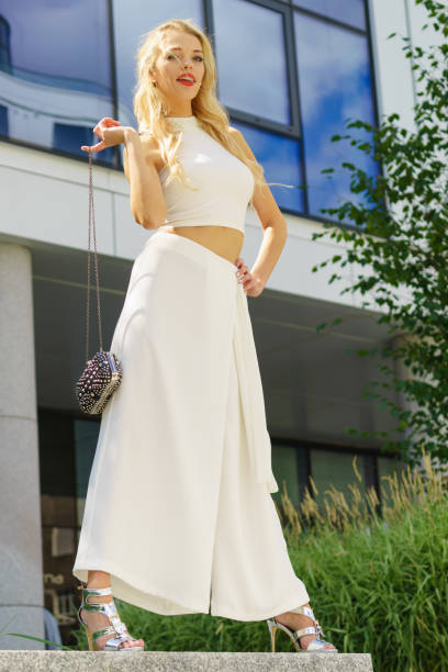 istock Woman wearing crop top and culottes 1162184297