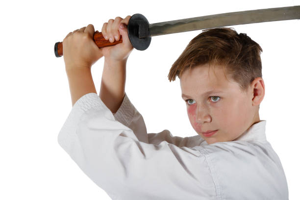 istock Teenage boy doing martial arts 1162186765