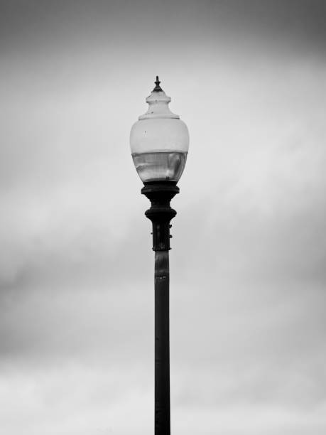 istock Street Lamp with Stormy Sky B&W 1162186780