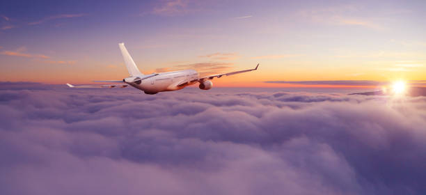 istock Passengers commercial airplane flying above clouds 1162189927