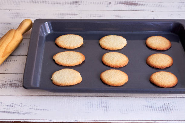 istock Cookies taken from the oven on a table 1162190034