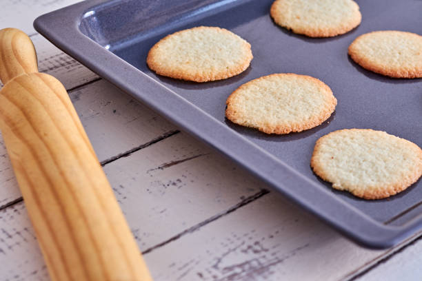 istock Cookies taken from the oven on a table 1162190071