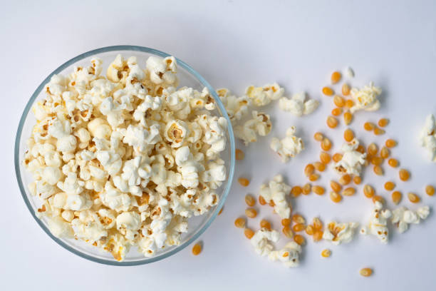 istock popcorn in bowl isolated on white background 1162190104