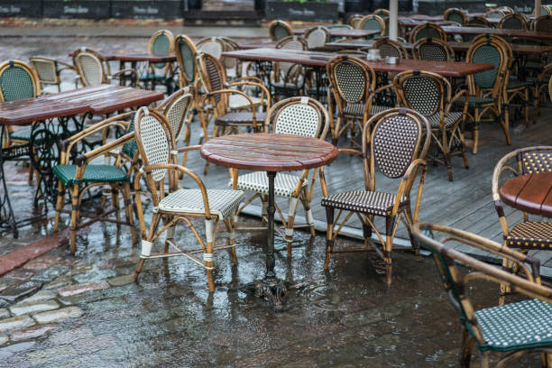 An empty cafe in Dome square, Old Town Riga during rain.