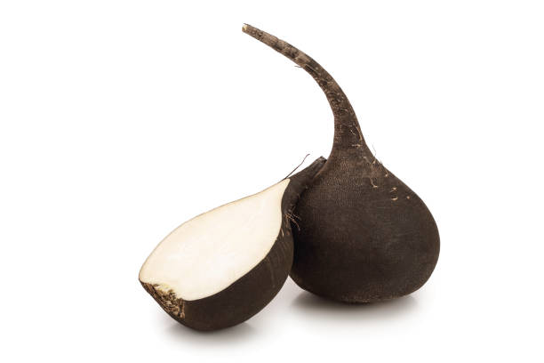 istock Black radish with half isolated on white background 1162193055
