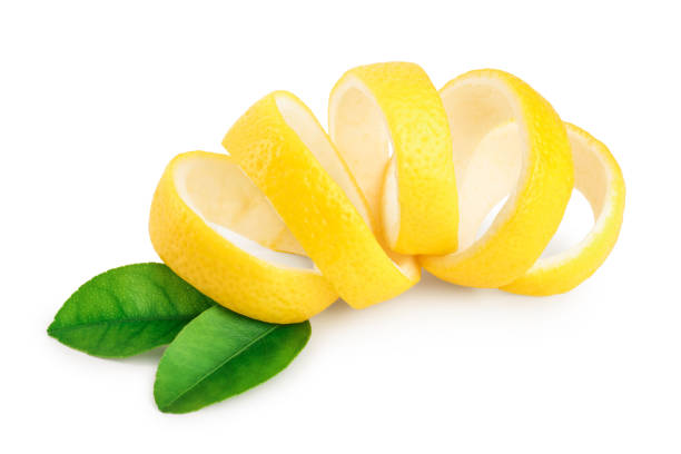 istock Lemon peel with leaf isolated on white background. Healthy food 1162194566