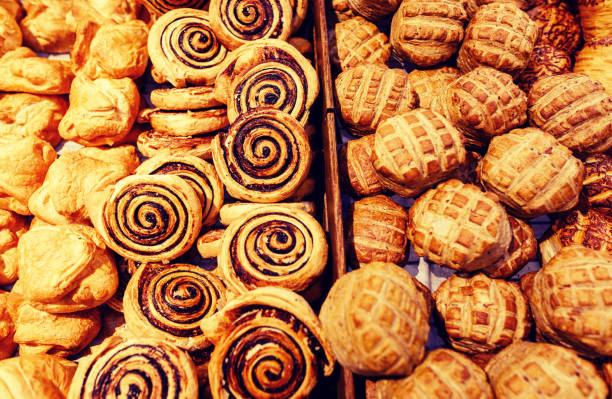 istock Mixed bread rolls buns coil with cocoa - Scandinavian Christmas cakes 1162195503