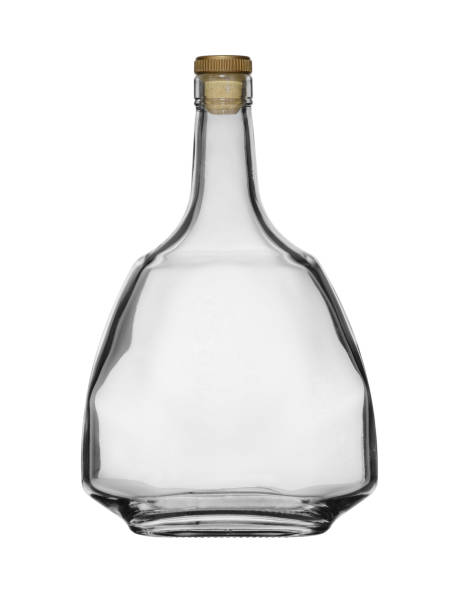 Empty glass bottle for brandy and cognac closed by a stopper on a white background