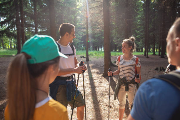 istock Group of hikers talking and taking a breather 1162196489