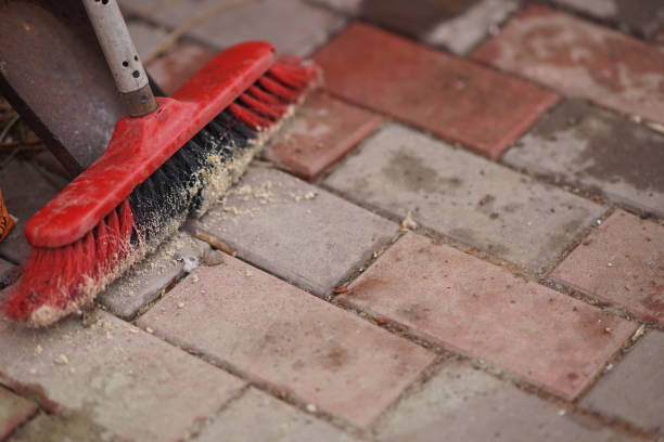 istock Broom and dustpan on a stone tiled floor in the courtyard 1162198708