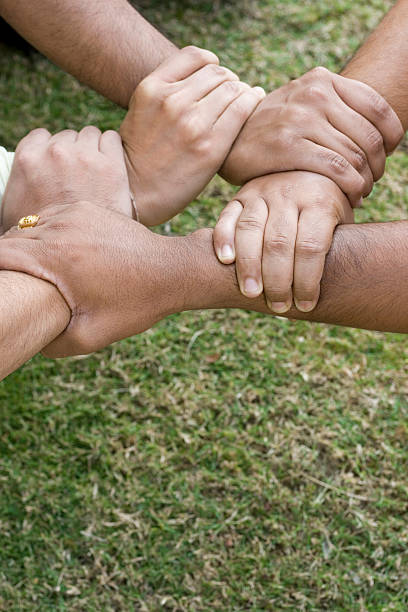 istock United hands showing unity Vertical Outdoor 116220036