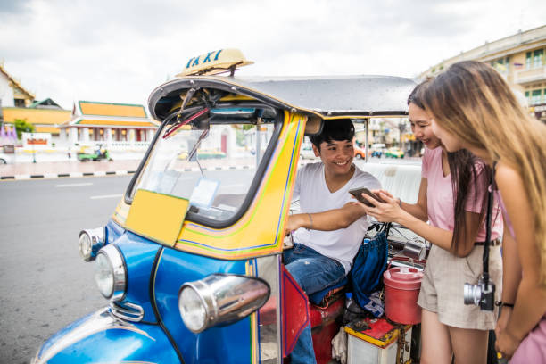 istock Asian friends hiring tuk-tuk 1162201541