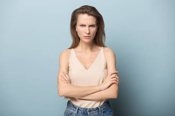 istock Dissatisfied millennial woman showing angry face expression. 1162203080