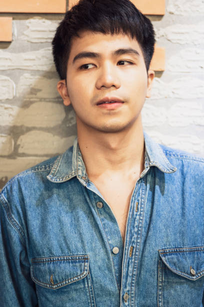 istock Young confidence cool handsome asian man standing posing 1162203745