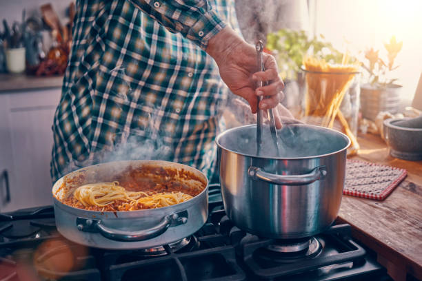 istock Preparing Spaghetti Bolognese in Domestic Kitchen 1162205699