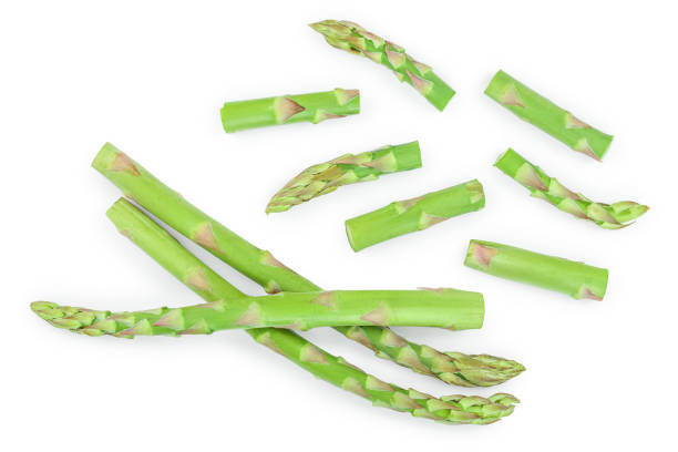 istock Fresh sprouts of asparagus isolated on white background. Top view. Flat lay 1162205882