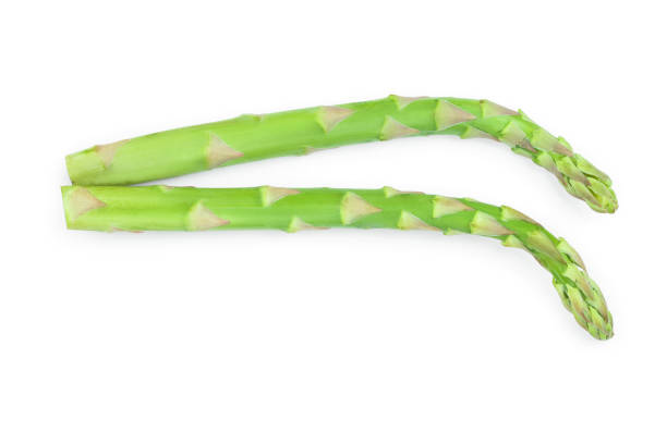 istock Fresh sprouts of asparagus isolated on white background. Top view. Flat lay 1162205906