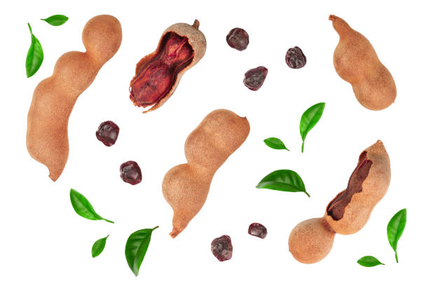 istock Tamarind fruit with leaf and seed isolated on white background, Top view. Flat lay 1162205977