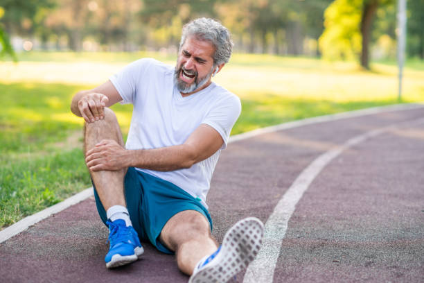istock Mature man runner with knee pain 1162206105