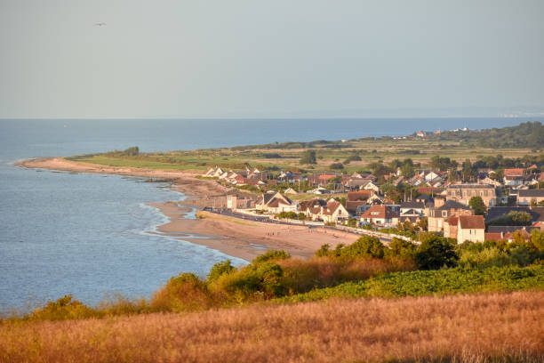 istock French Normandy coast village at sunset. 1162209356