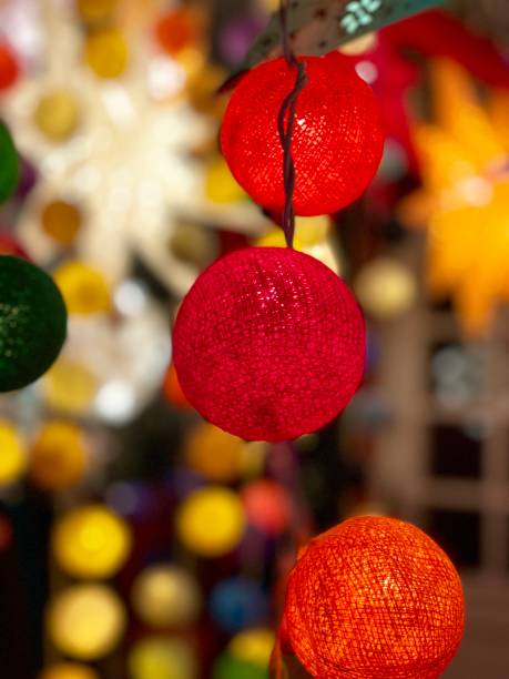 istock Garland with round thread lamps on Christmas market 1162209478