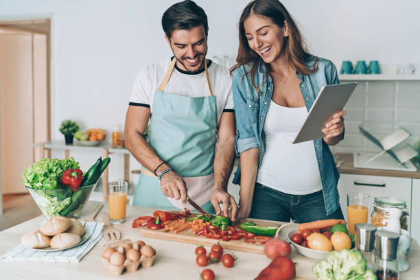 Young family cooking together