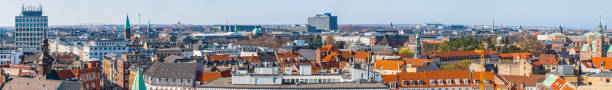 istock Copenhagen aerial panorama over downtown city rooftops Denmark 1162210768
